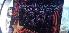 За несколько дней до празднования юбилея Дня Победы в городе Алапаевск в России повесили плакат с изображением фашистов вместо советских солдат. Фотографию немцев украсили георгиевской лентой.